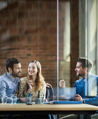 Couple discusses insurance with professional