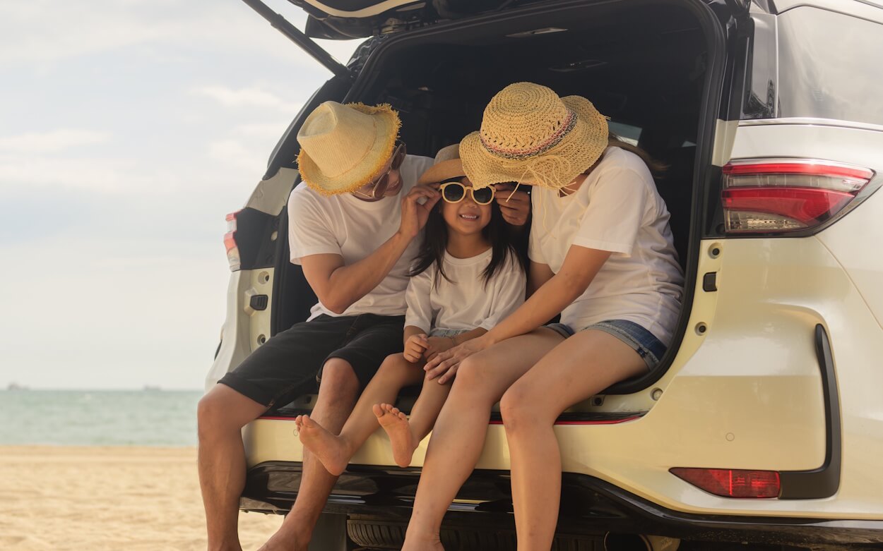 Happy family on beach, Family with car having fun on beach