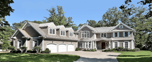 looking at front of mansion on a beautiful sunny day